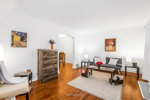 sitting room featuring hardwood / wood-style flooring