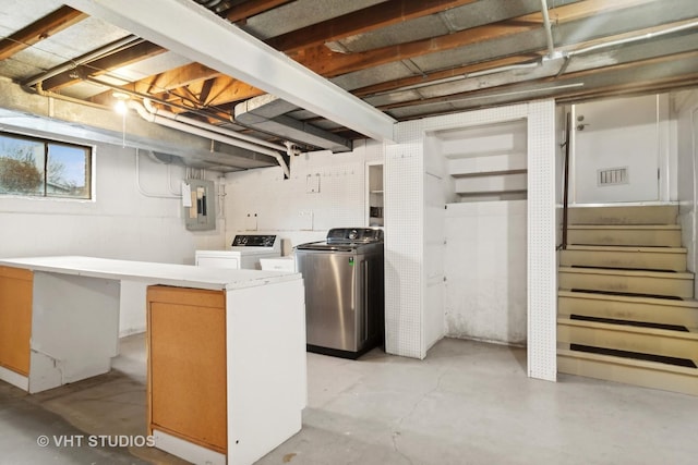 laundry area featuring washer and dryer and electric panel