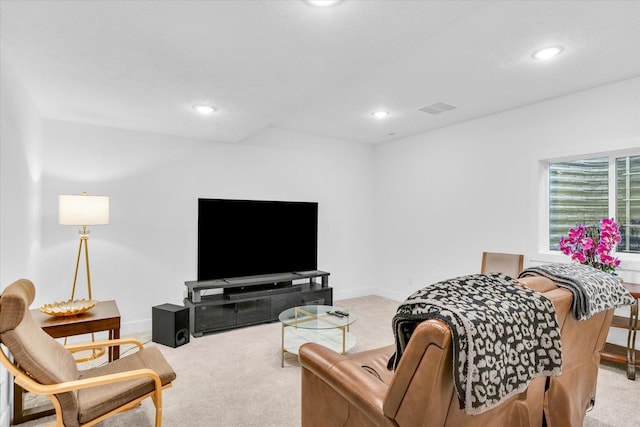 living area featuring light carpet, recessed lighting, visible vents, and baseboards