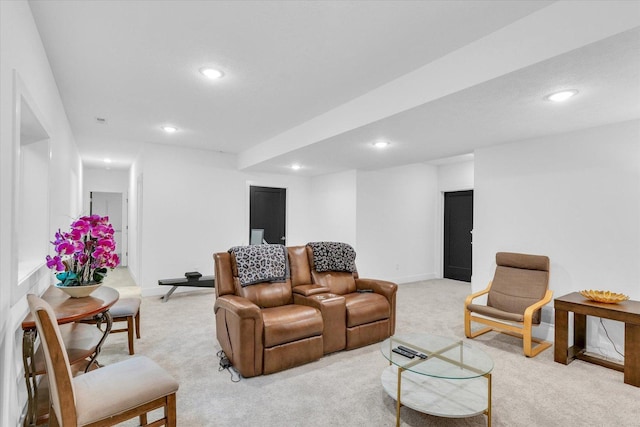 living room featuring recessed lighting, light colored carpet, and baseboards