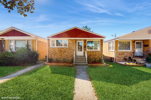 view of front facade featuring a front yard