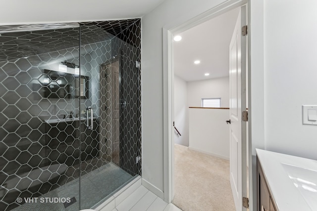 bathroom featuring vanity and walk in shower