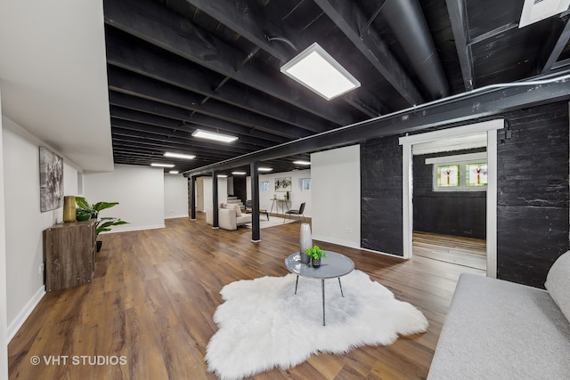 basement featuring wood-type flooring