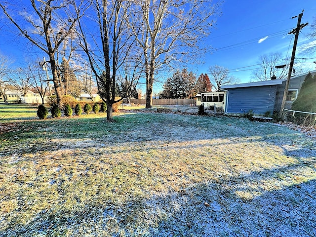 view of yard with a sunroom