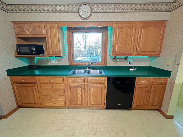 kitchen featuring sink and black appliances