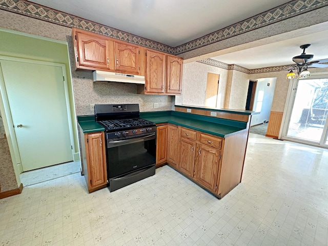 kitchen featuring ceiling fan and black gas range oven