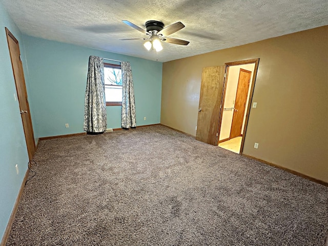 interior space featuring a textured ceiling and ceiling fan