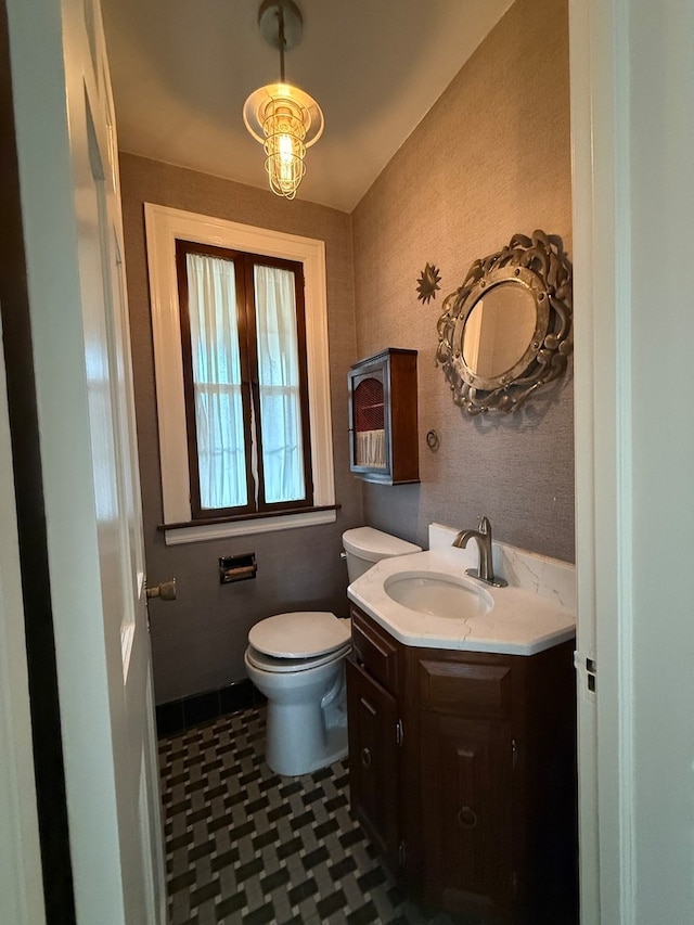 bathroom with vanity and toilet