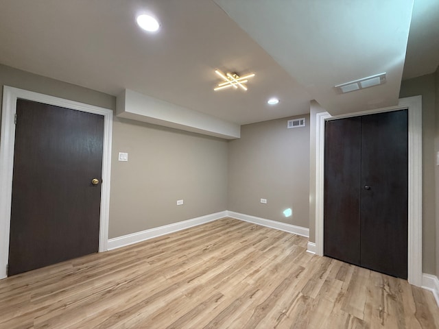 basement with light wood-type flooring