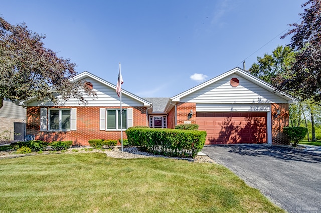 single story home featuring a front yard and a garage