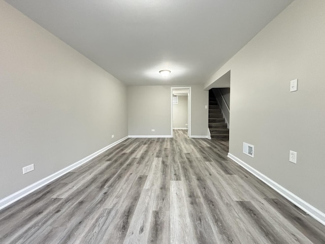 empty room with light hardwood / wood-style floors