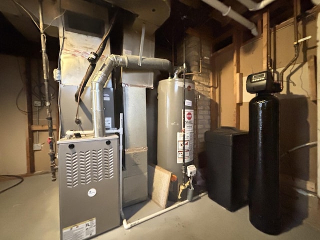 utility room with gas water heater