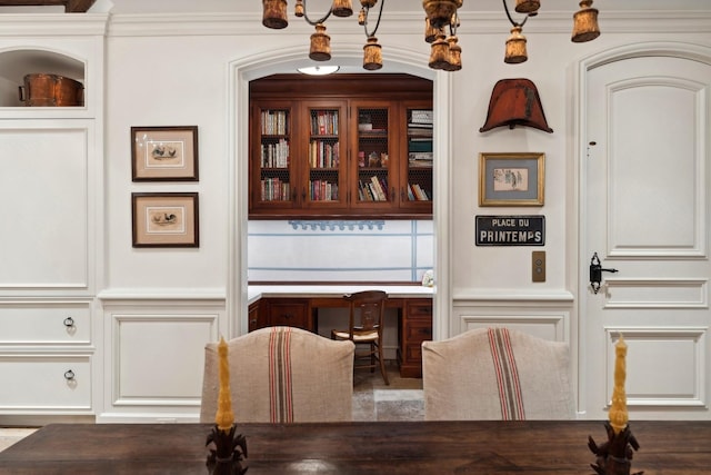 dining area featuring ornamental molding