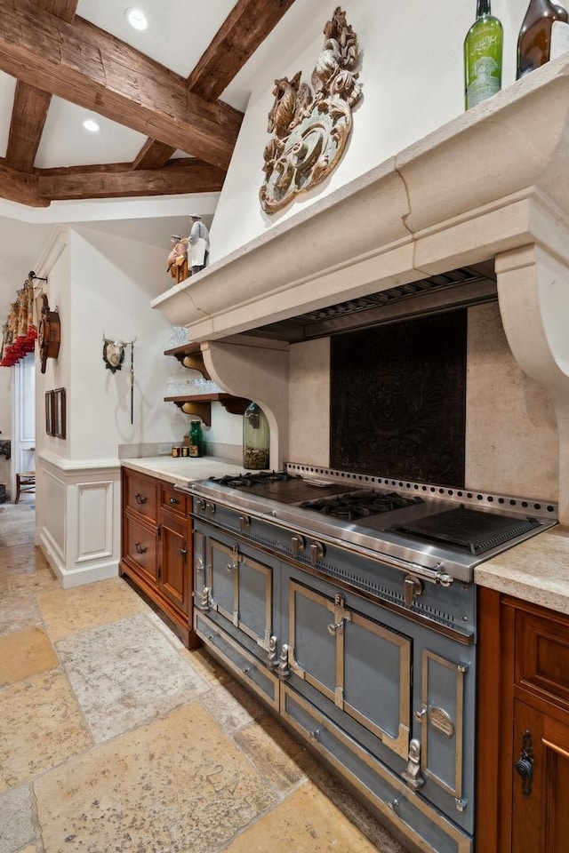 kitchen featuring beamed ceiling