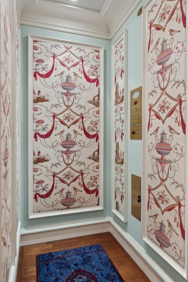 interior details featuring hardwood / wood-style flooring and crown molding