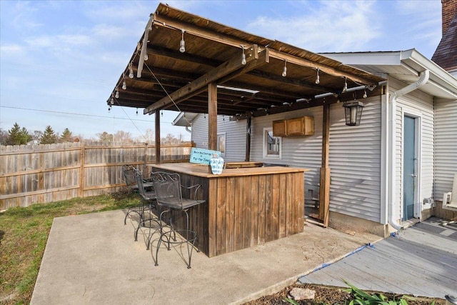 view of patio / terrace with exterior bar