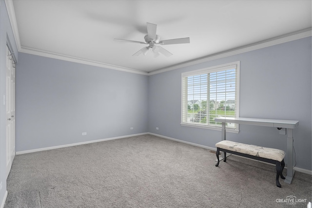 unfurnished room with carpet flooring, ceiling fan, and crown molding