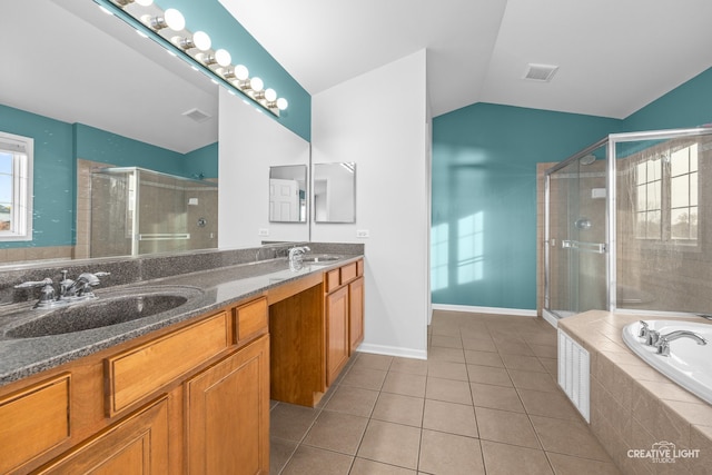 bathroom featuring tile patterned floors, vanity, plus walk in shower, and lofted ceiling