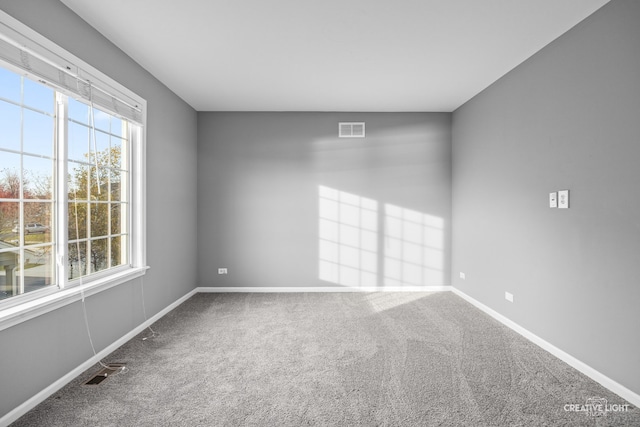 view of carpeted spare room