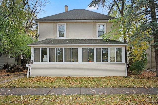 exterior space with a sunroom