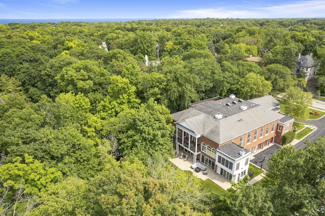 bird's eye view featuring a forest view