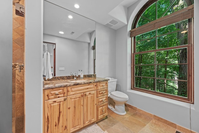 full bath with recessed lighting, visible vents, toilet, and vanity