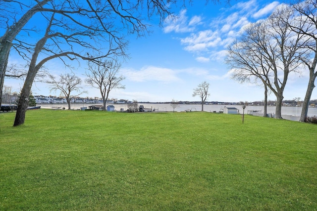 view of yard with a water view