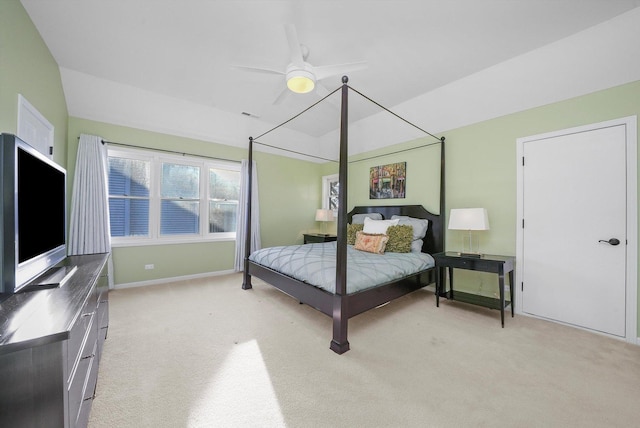 carpeted bedroom featuring ceiling fan and lofted ceiling