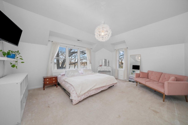 carpeted bedroom with a notable chandelier, vaulted ceiling, and multiple windows