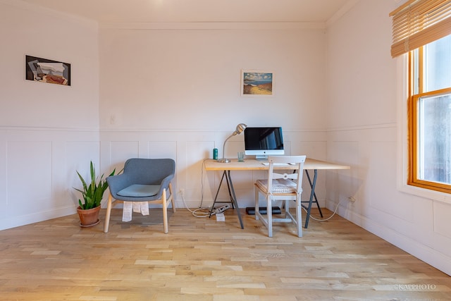 office with crown molding and light wood-type flooring