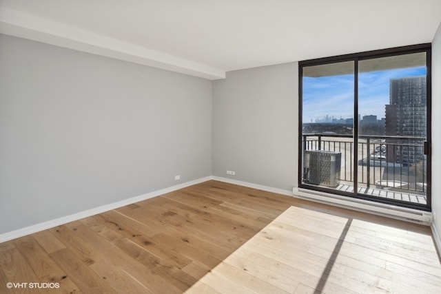 empty room featuring hardwood / wood-style floors