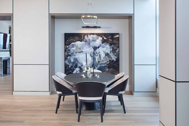 dining room with light hardwood / wood-style floors