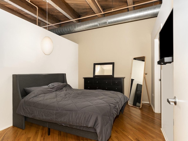 bedroom featuring hardwood / wood-style flooring