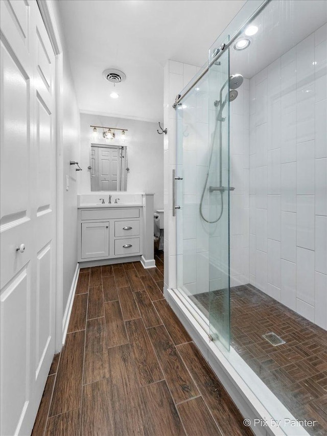 bathroom with vanity and walk in shower