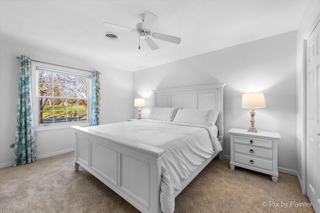 carpeted bedroom featuring ceiling fan