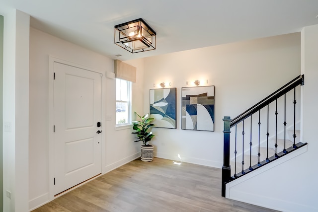 entrance foyer featuring light wood-type flooring