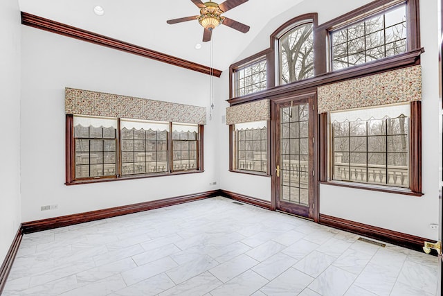 unfurnished room featuring ceiling fan, lofted ceiling, and ornamental molding