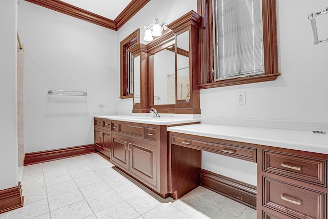 bathroom featuring vanity and ornamental molding