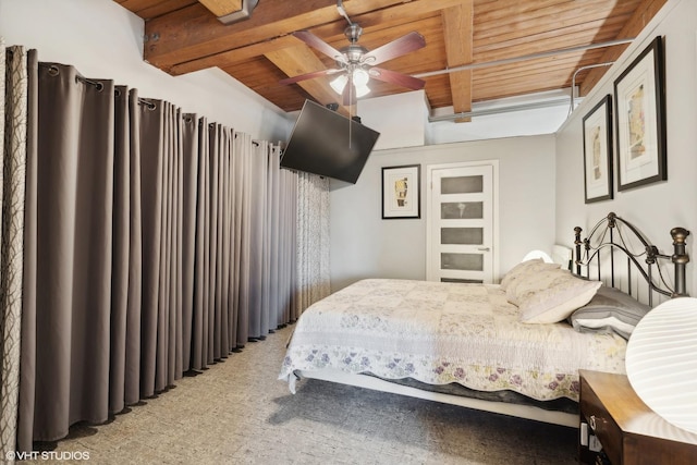 bedroom with beam ceiling, ceiling fan, and wooden ceiling