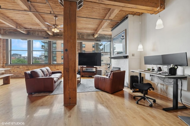 interior space featuring beamed ceiling, light hardwood / wood-style flooring, ceiling fan, and wooden ceiling