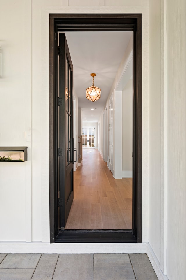 hall featuring hardwood / wood-style flooring