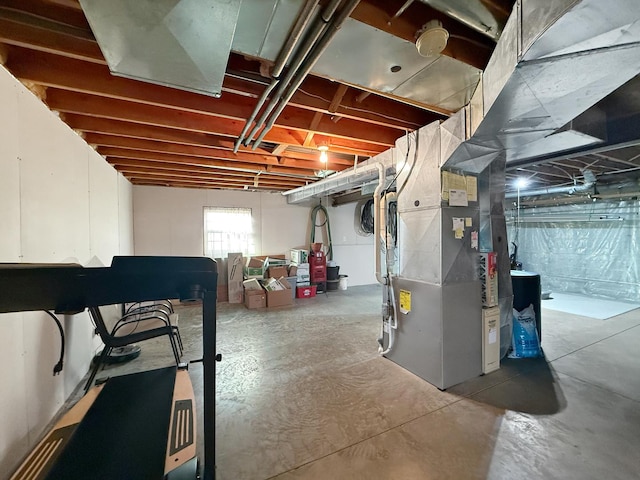 basement featuring heating unit