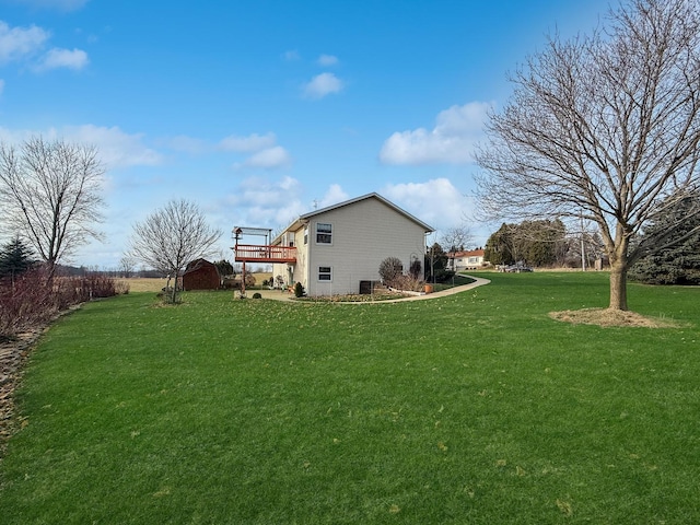 view of yard with a deck