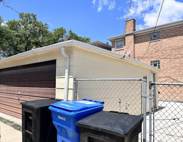 view of property exterior featuring a garage