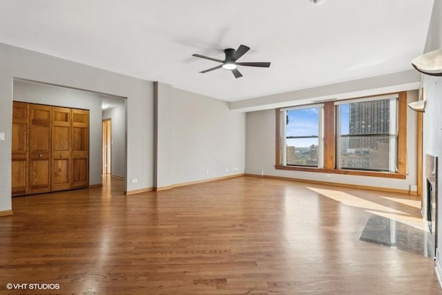 interior space with hardwood / wood-style flooring and ceiling fan