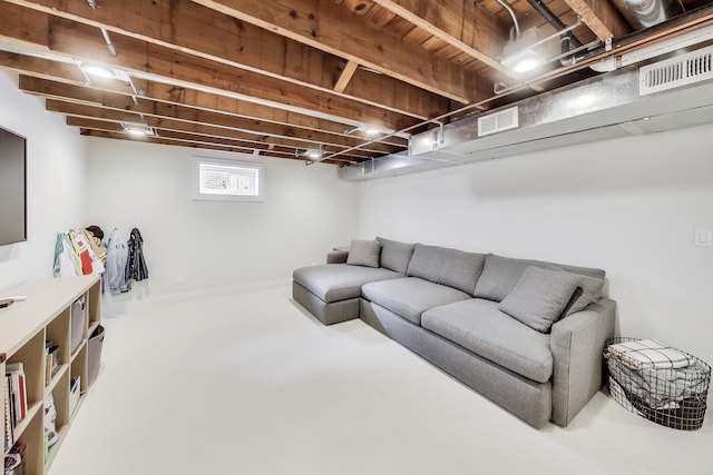 living room featuring concrete flooring