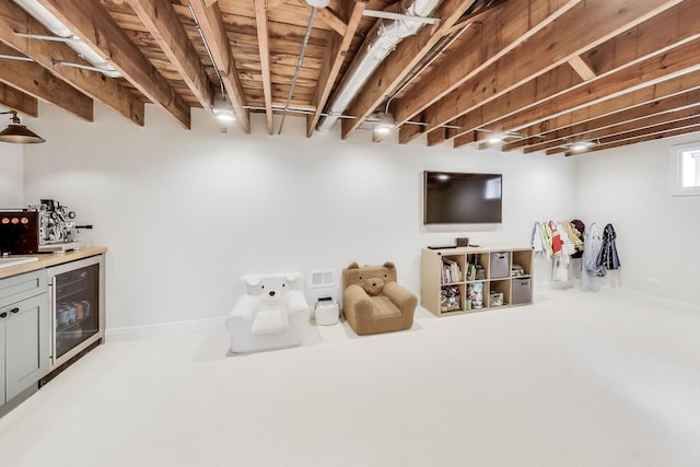 basement featuring wine cooler