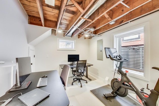 office area with electric panel and lofted ceiling