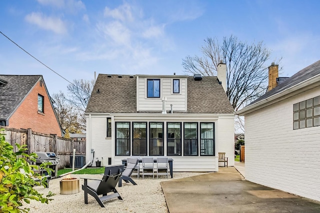 rear view of property with a patio area