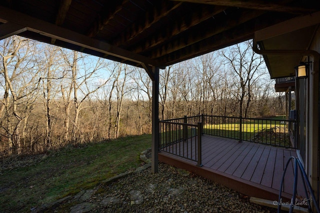 deck featuring a yard